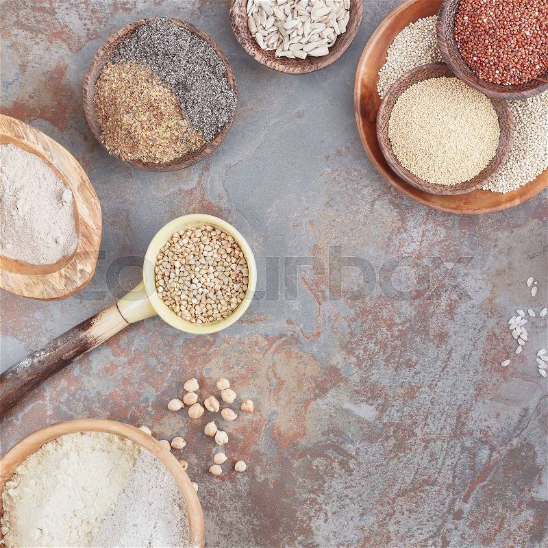 Gluten free grains and flours. A variety of gluten free ingredients, top view, blank space, stock photo