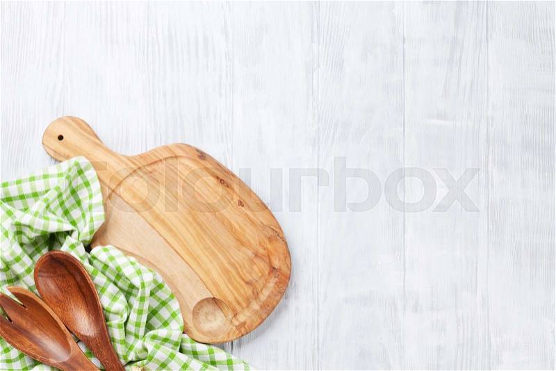 Cooking utensils on wooden table. Top view with copy space, stock photo