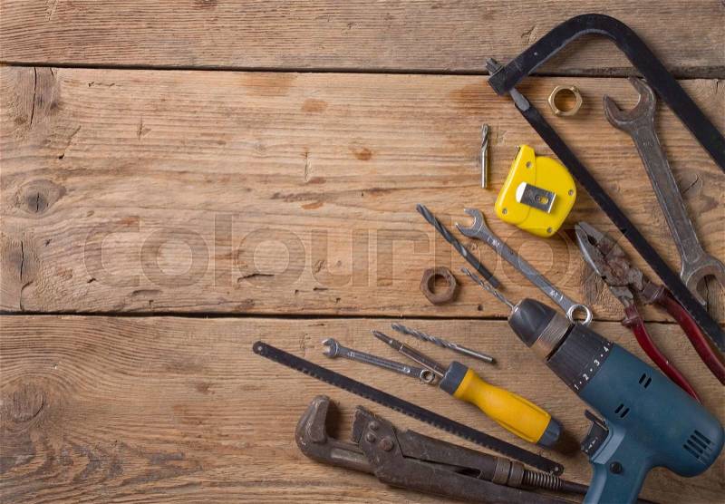 Tool renovation on grunge wood, stock photo