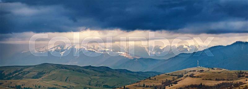 Spring storm, rain and clouds in Carpathian mountains, stock photo