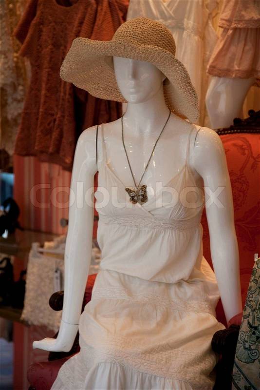 Mannequin in fashion shop urban Paris, France showing summer fashion, stock photo