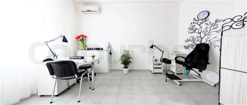 Panoram of beauty salon manicure nail manicure, bright room and equipment, stock photo