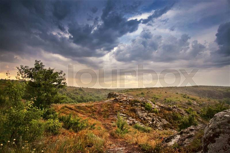 Rain and storm sky. Spring clouds and rain in Ukraine, stock photo