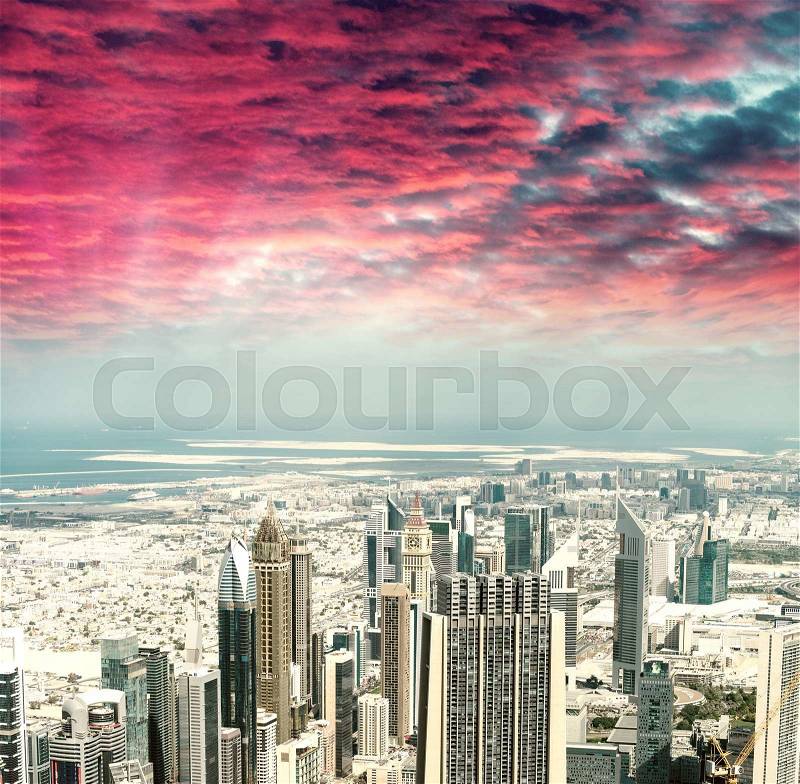 Dubai, United Emirates. Amazing skyline at sunset, stock photo