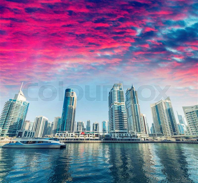 Dubai at dusk, United Emirates. City skyline, stock photo