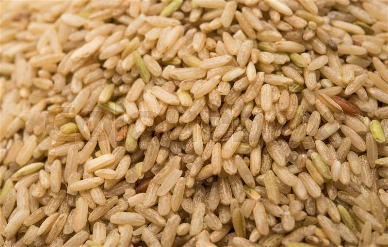 Closeup pile of brown rice, stock photo