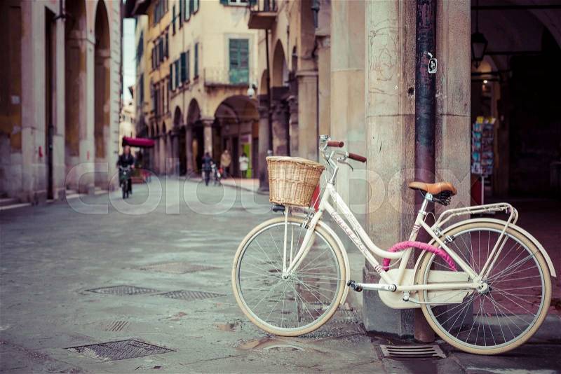 PISA, ITALY - MARCH 10, 2016: Old town vintage and bike, stock photo