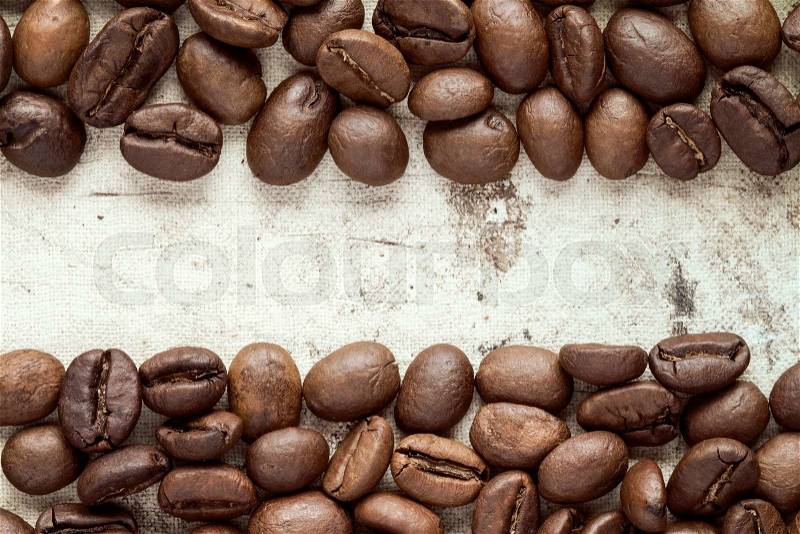 Coffee beans at border of image(upper & lower) with blank area for copy-space, stock photo