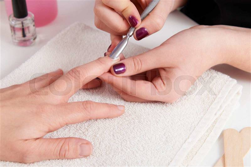 Woman Having Manicure At Beauty Salon, stock photo