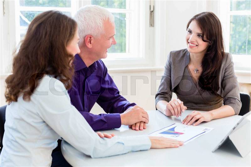 Senior woman and man at retirement financial planning with consultant or advisor, stock photo