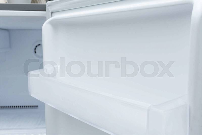 Empty refrigerator freezer of kitchen appliance, stock photo
