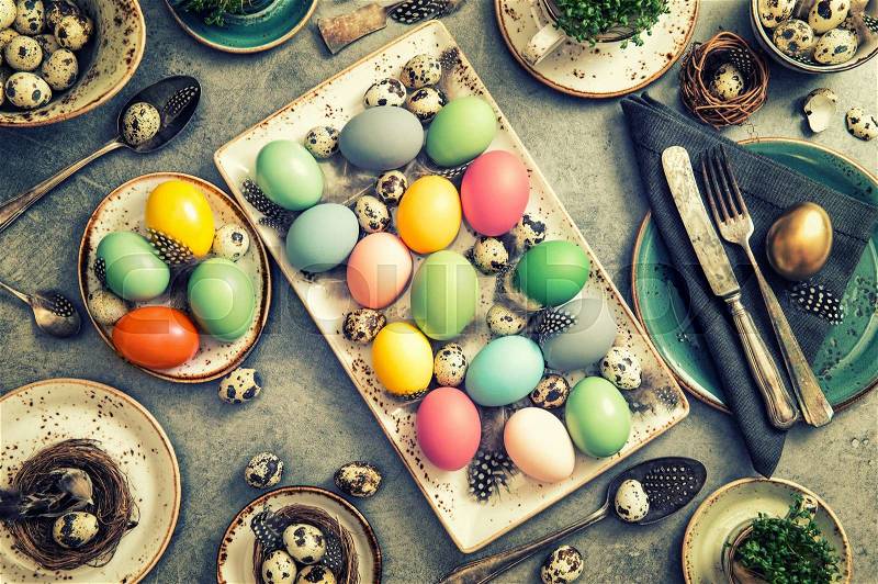 Easter still life with colored eggs. Vintage style toned photo, stock photo