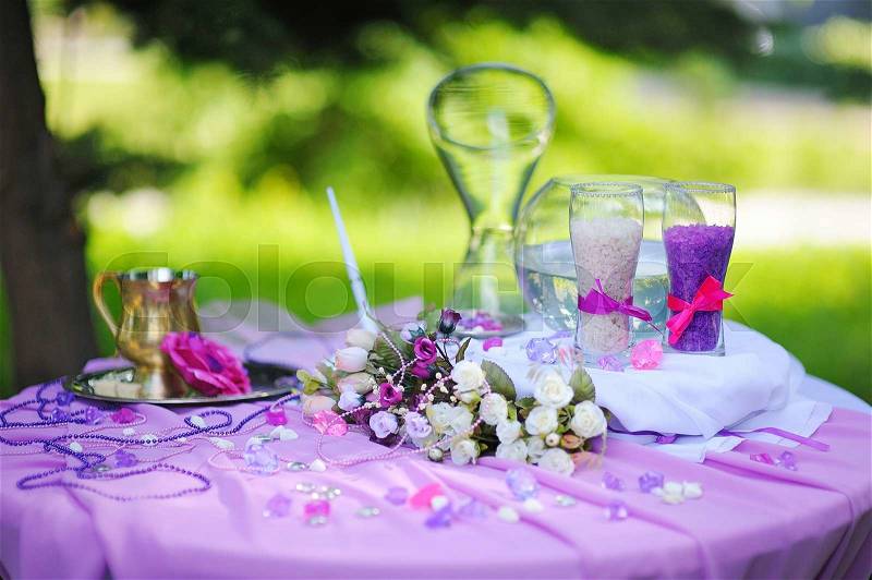 Wedding decoration for the sand ceremony on table, stock photo