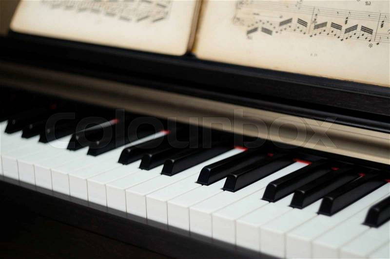 Keyboard piano sheet with notes, stock photo
