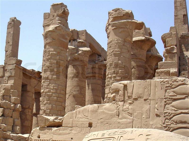 Ancient Columns in the Karnak temple with ancient images, stock photo