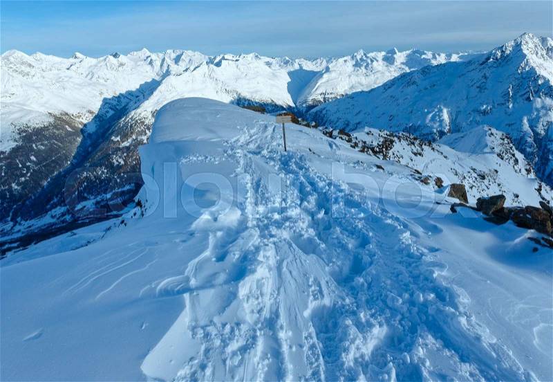 Winter mountain scenery from hill top with snowdrift (Tyrol, Austria), stock photo