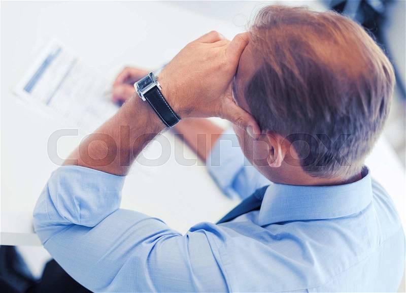 Business, office, school and education concept - man signing a contract, stock photo