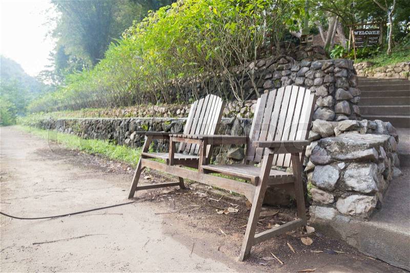 Chairs, garden benches Located on the lawn along the walk in the park, stock photo