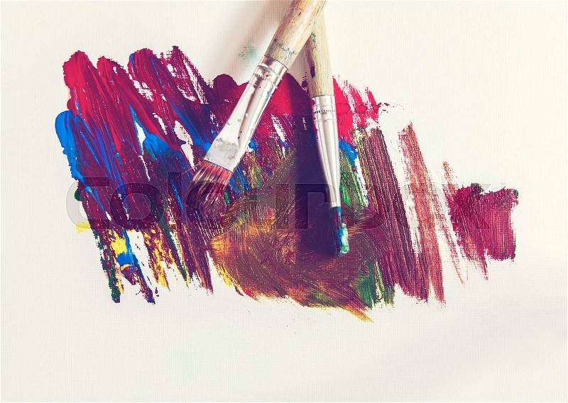 Image of acrylic paint smeared on paper. Vintage styled, stock photo