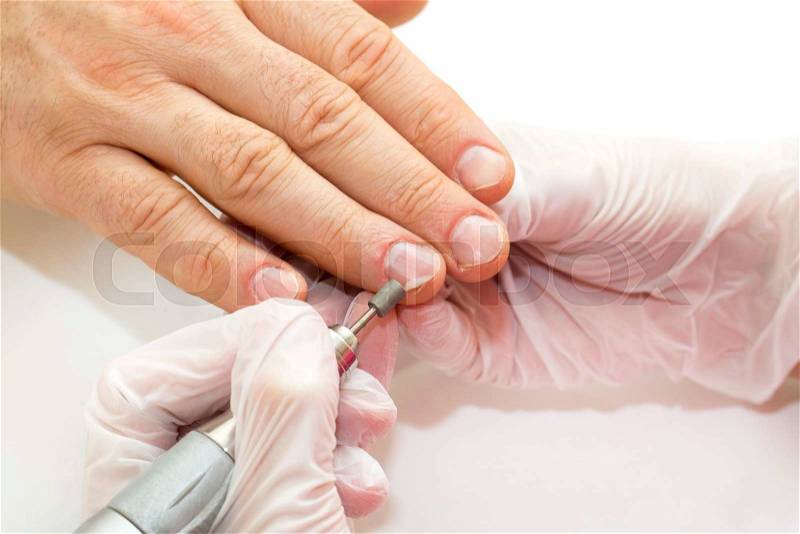 The process of the male manicure in a beauty salon, stock photo