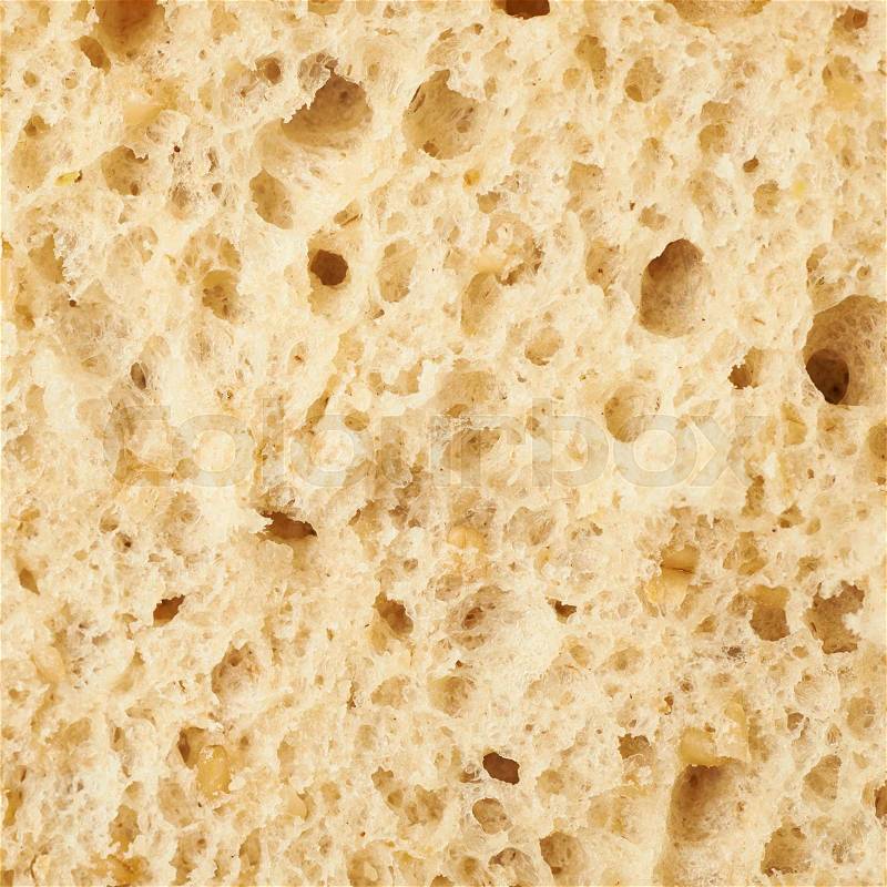 Close-up fragment of a white bread texture as a background composition, stock photo