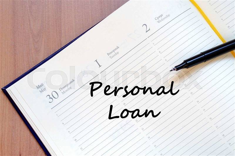Personal loan text concept write on notebook with pen, stock photo