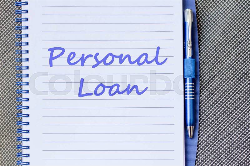 Personal loan text concept write on notebook with pen, stock photo