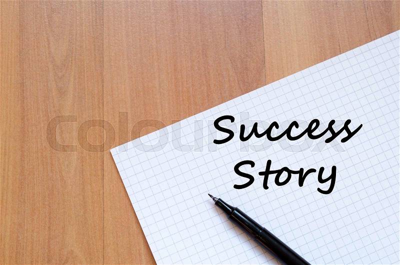 Success story text concept write on notebook with pen, stock photo