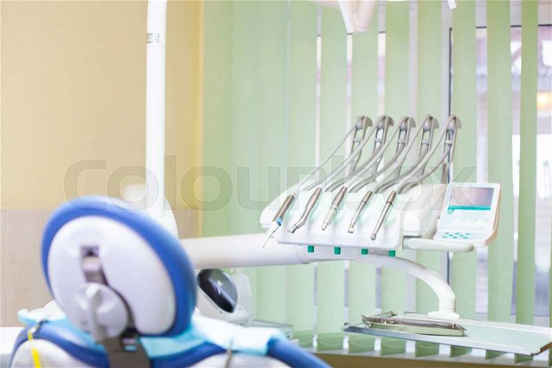Different dental instruments and tools in a dentists office, stock photo