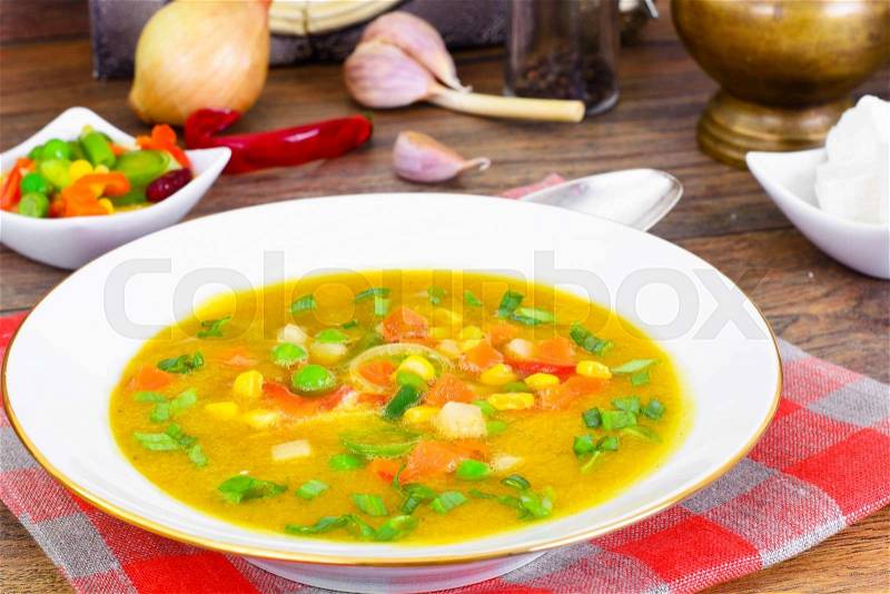 Pumpkin-Carrot Soup with Mexican Vegetable Mix Studio Photo, stock photo
