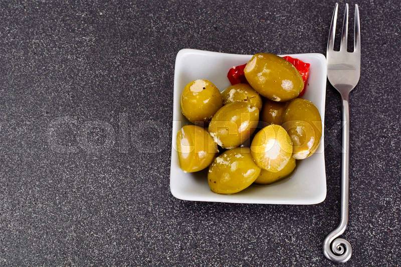 Green Olives Stuffed with Cheese on Dark Background. Studio Photo, stock photo