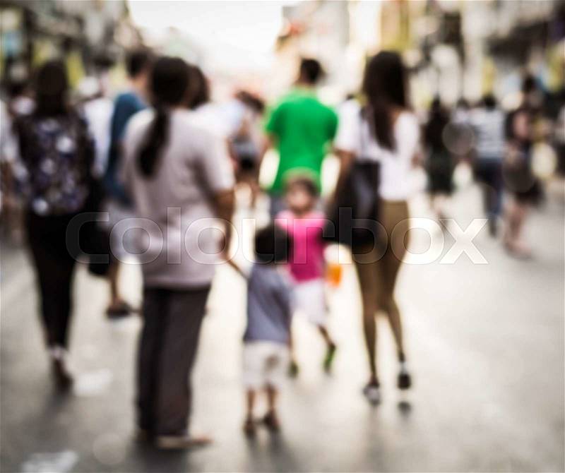 Abstract of blurred people walking on the street of phuket old town, stock photo