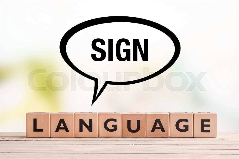 Braille language lesson sign made of cubes on a table, stock photo