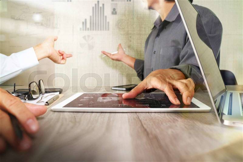 Businessman making presentation with his colleagues and business strategy digital layer effect at the office as concept , stock photo
