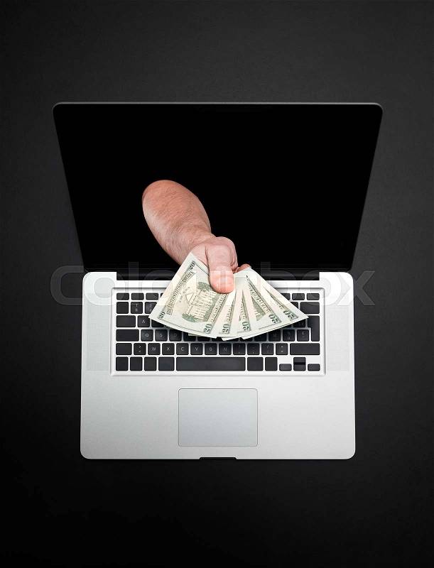 Getting money from laptop monitor screen - Online Transaction, Online Banking theme, stock photo