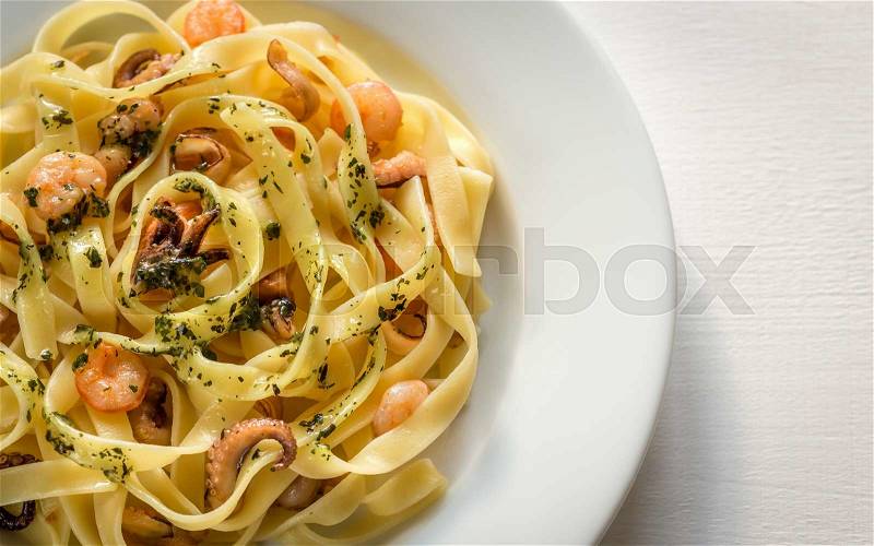 Tagliatelle pasta with seafood, stock photo