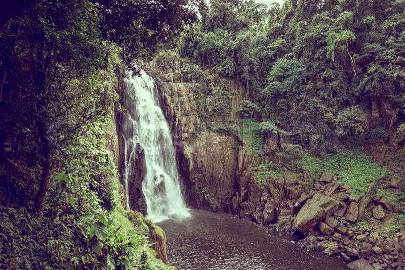 Landscape of waterfall in the rainforest, vintage effect, stock photo