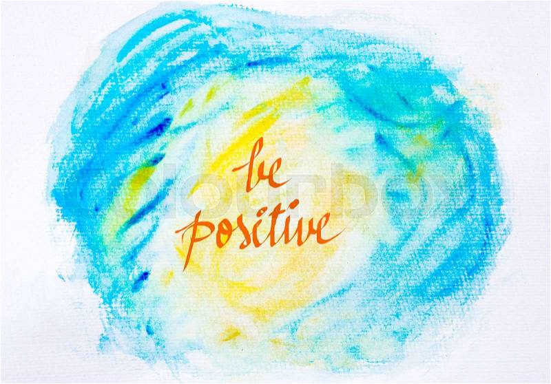 Inspirational abstract water color textured background in blue and yellow colors, BE POSITIVE message, stock photo
