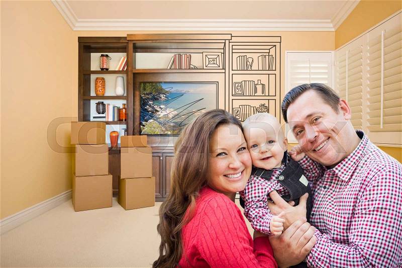 Young Family In Room With Moving Boxes and Drawing of Entertainment Unit On Wall, stock photo