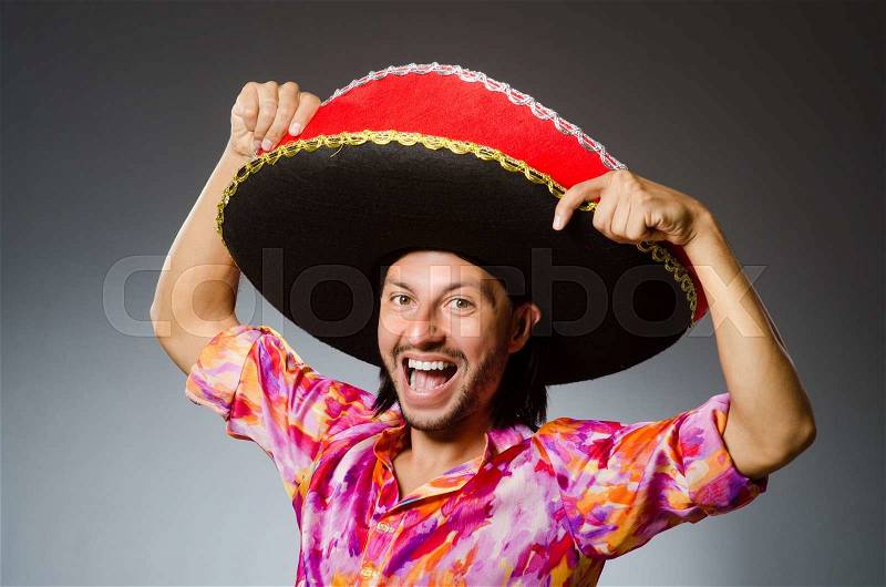 Young mexican man wearing sombrero, stock photo