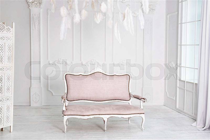 Classical interior with pink sofa. White modern interior with panoramic windows and sofa, stock photo