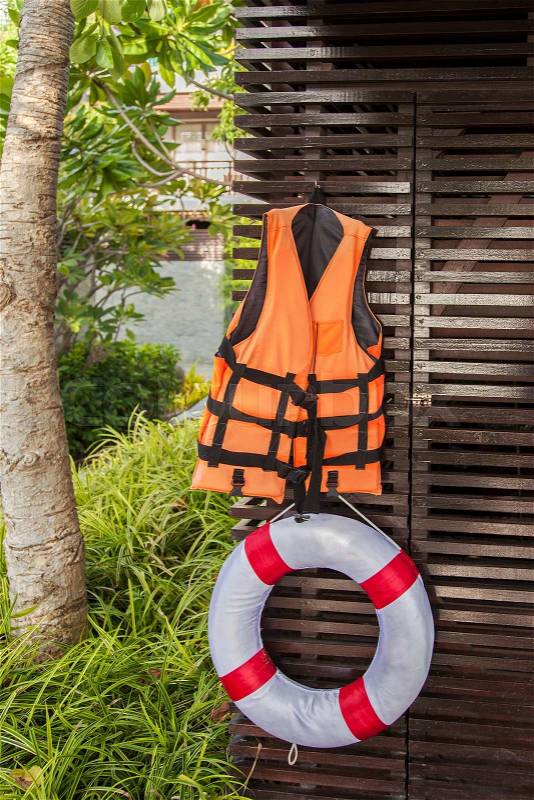 Image of a life jacket and life bouy. , stock photo