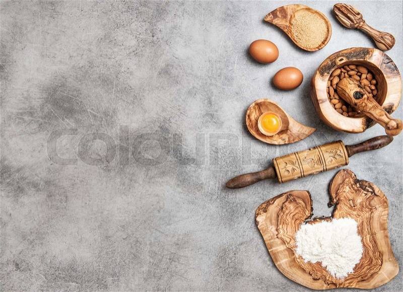 Eggs, flour, sugar, almond. Ingredients for dough preparation. Food background, stock photo