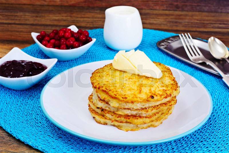 Fried Potato Pancakes with Cranberry Jam. Belarusian and German Cuisine. Studio Photo, stock photo