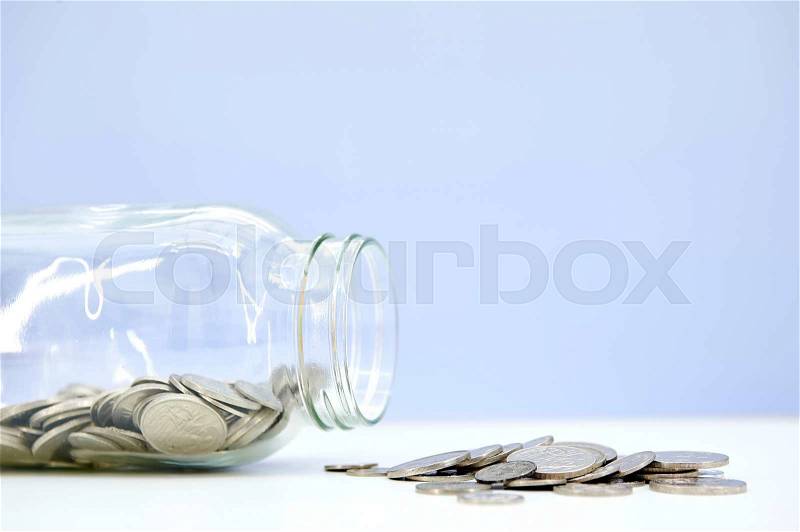 A studio photo of a money jar, stock photo
