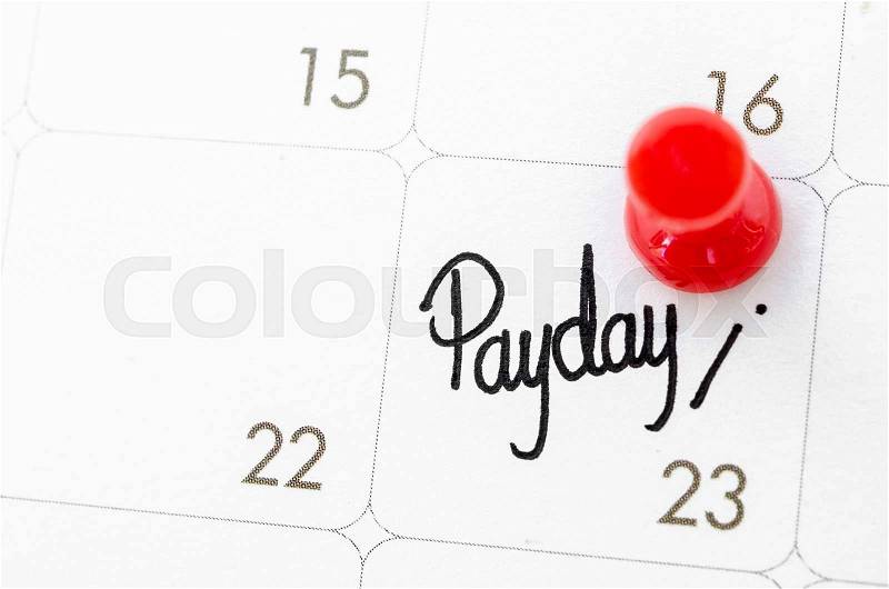 Pay day of the month on calendary page, stock photo