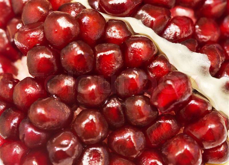 Close up shot of a ripe pomegranate, stock photo