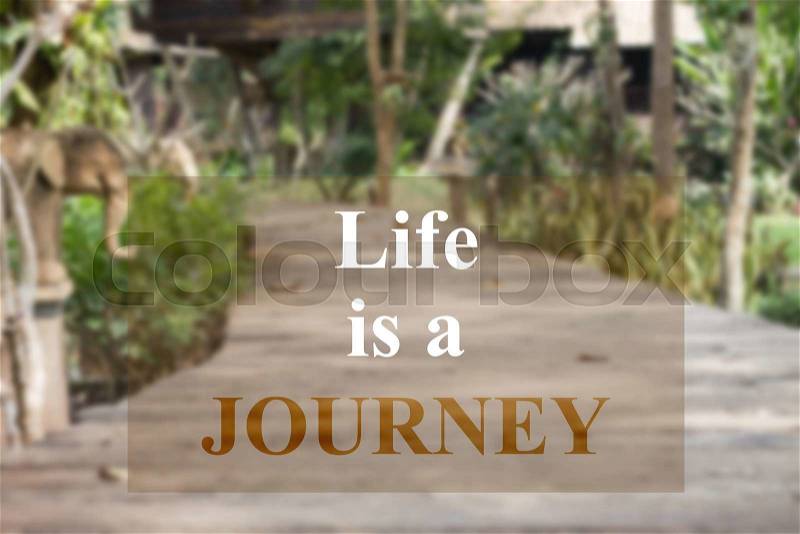 Life is a journey insparational quote on garden background, stock photo
