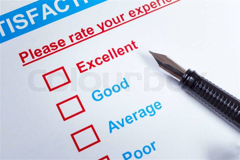 Customer satisfaction survey checkbox with rating and pen, can use any business concept, stock photo