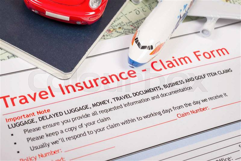 Travel Insurance Claim application form on table, business and risk concept; document,car and plane is mock-up, stock photo